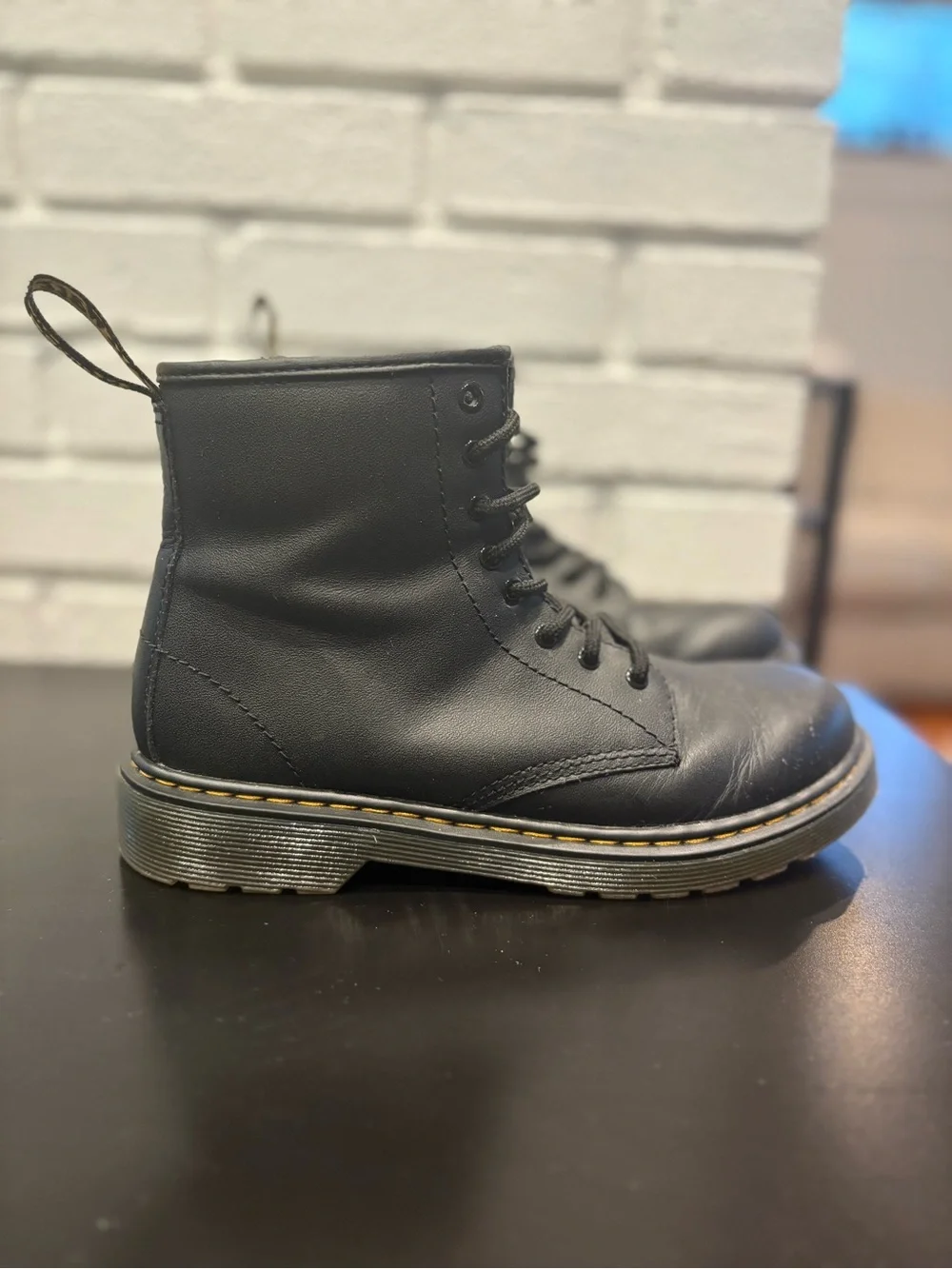 Dr. Martens Black Leather Kids Lace-Up Boots with Yellow Welt Stitching